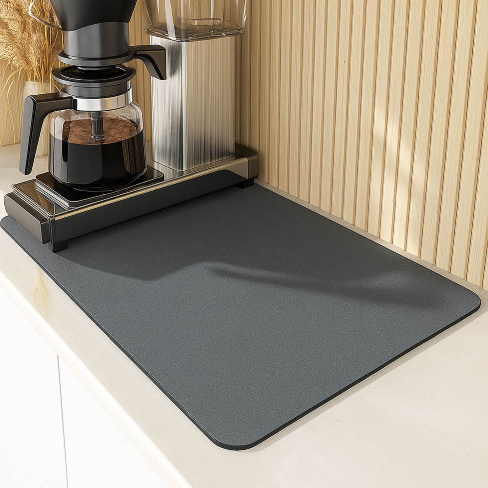 Anti-slip absorbent mat for coffee machine